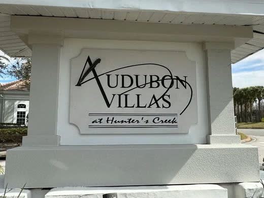 The entrance sign at Audubon Villas at Hunter's Creek.