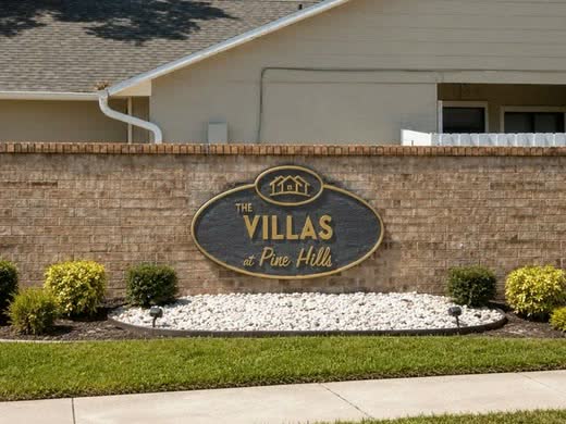 The entrance sign at The Villas at Pine Hills.